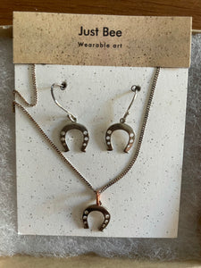 Horse shoe dangle earrings