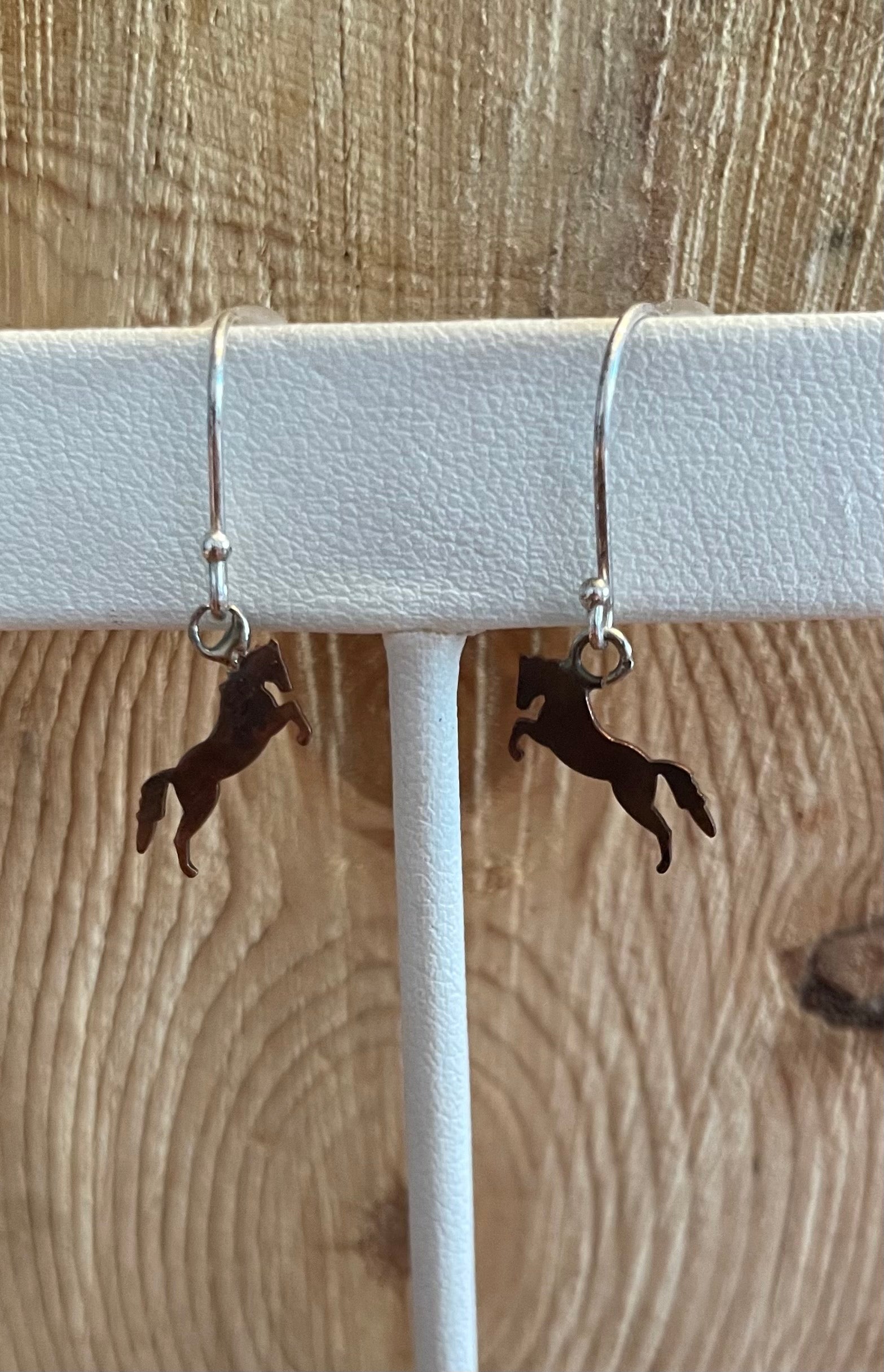 Jumping horse dangle earrings